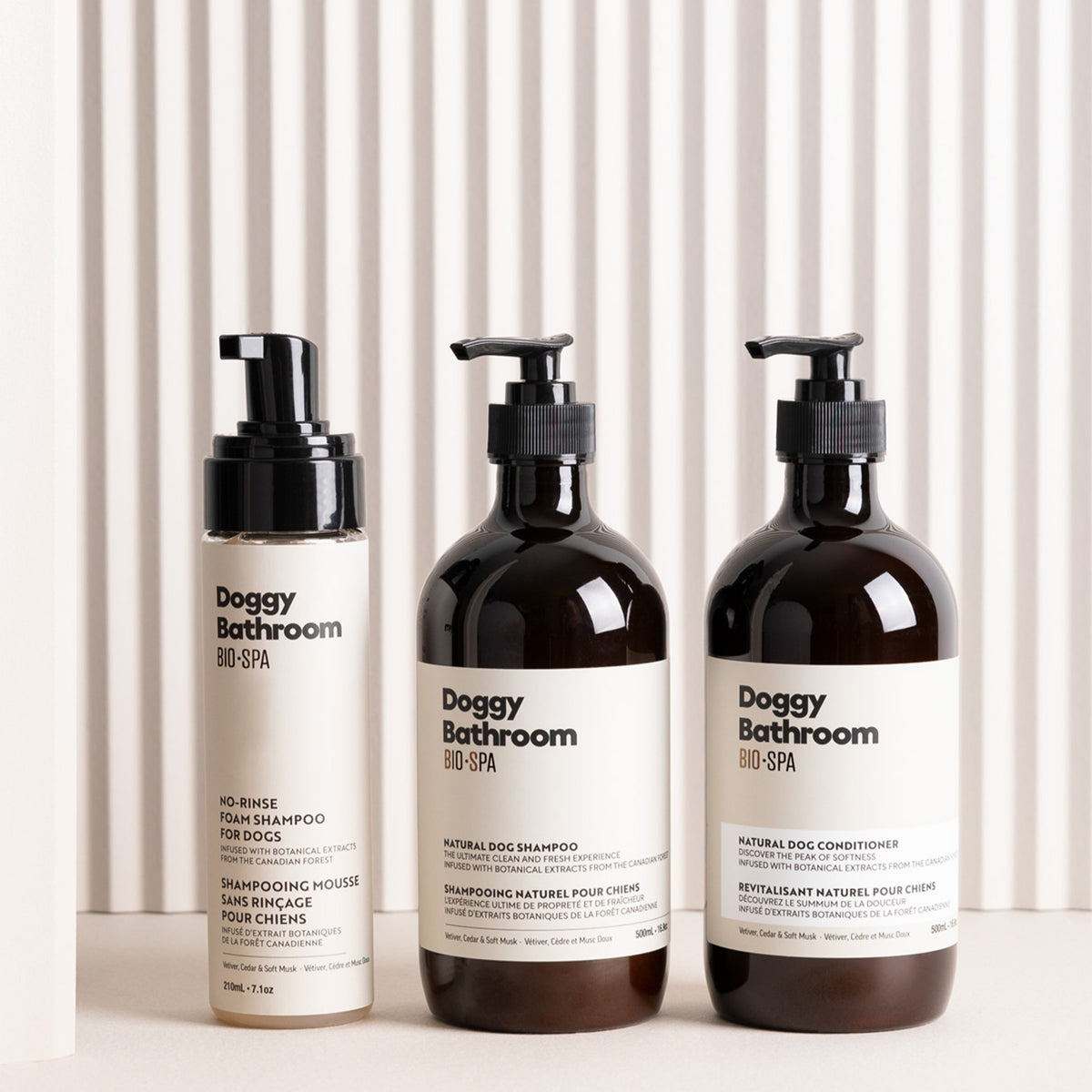 Three bottles of Doggy Bathroom products on a white background